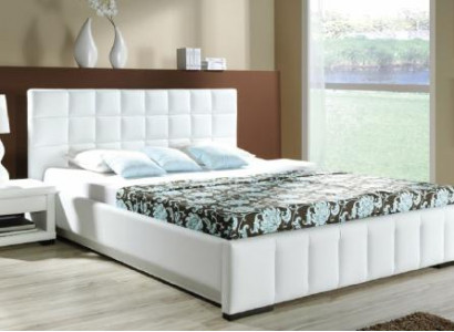 A luxurious designer bed in a sophisticated contemporary style of the highest quality